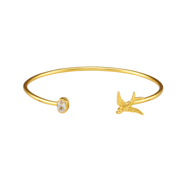 Armspange aus Messing, vergoldet, weißer Kristall